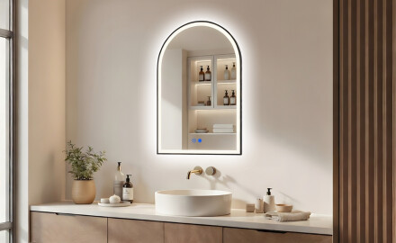 Irregular mirror with LED backlighting in a black aluminum frame