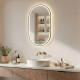 Oval LED-backlit mirror in a black aluminum frame #1